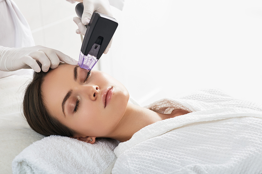 Woman Recieving Microneedling Services in Madisonville, LA | Hollrah Wellness