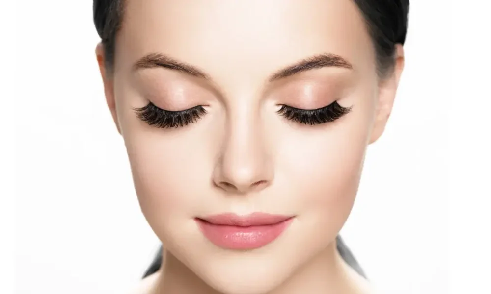 Close-up of a woman with long, full eyelashes after professional Lashes Extension in Madisonville, LA.